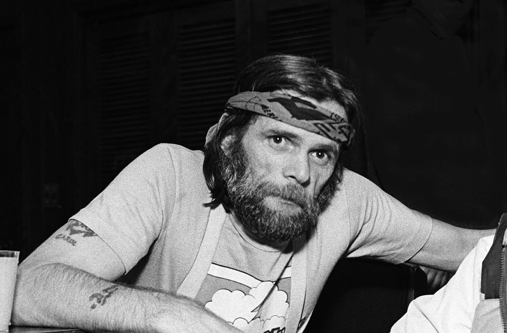 Johnny Paycheck Once Showed Up Shirtless To Canadian Court, & Yelled “F*ck The Queen” | Whiskey Riff