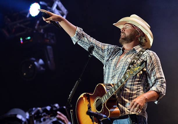 Musician Toby Keith performs during the Oklahoma Twister Relief Concert to benefit United Way of Central Oklahoma May Tornadoes Relief Fund at...