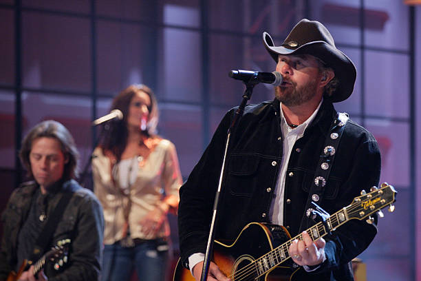 Episode 4350 -- Pictured: Musical guest Toby Keith performs on November 12, 2012 --